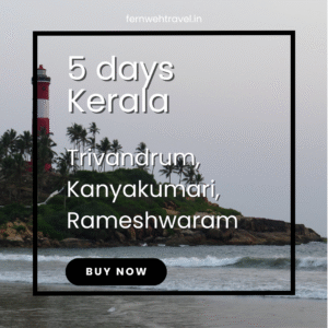 A tall white lighthouse standing on a sun-kissed beach, overlooking the Arabian Sea.